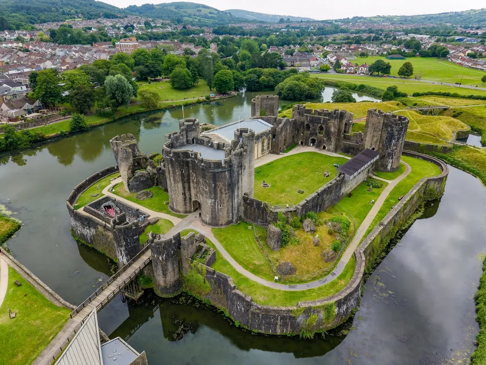 Aerial view of the historic Caerphilly Castle, a medieval fortress in Wales