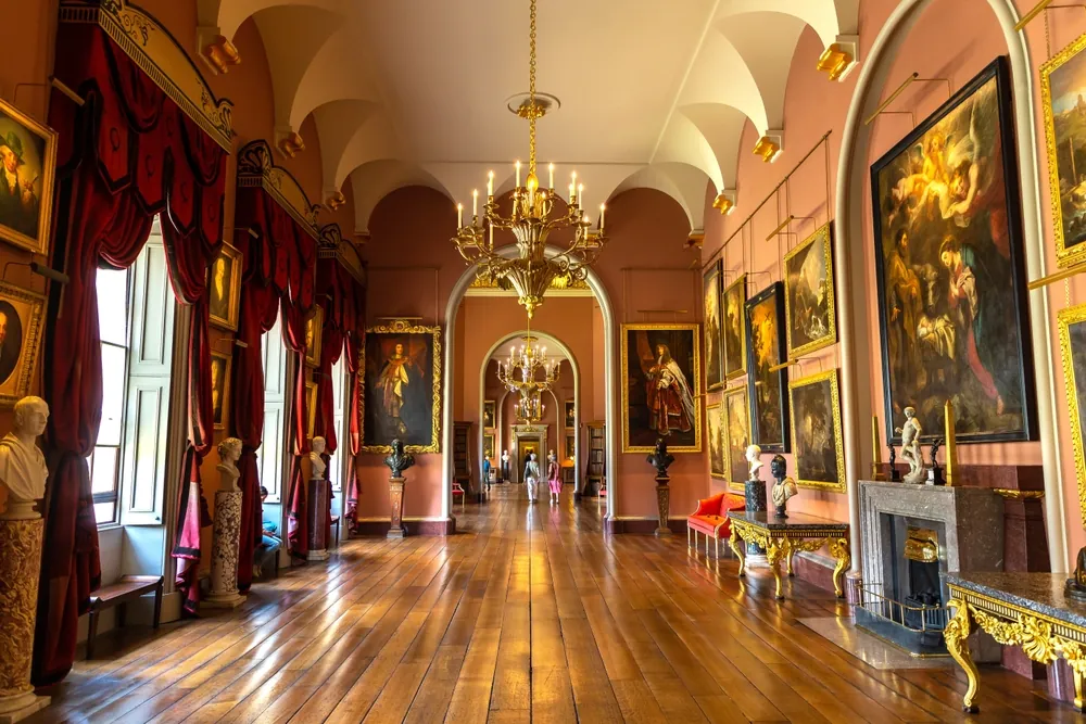 YORKSHIRE, UK - JUNE 30, 2025: Long Gallery South with classical paintings, arched ceilings and chandeliers at Castle Howard in North Yorkshire, England, United Kingdom