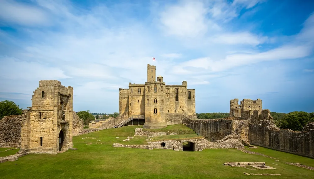 Warkworth Castle is a ruined medieval castle in Warkworth in the English county of Northumberland. UK