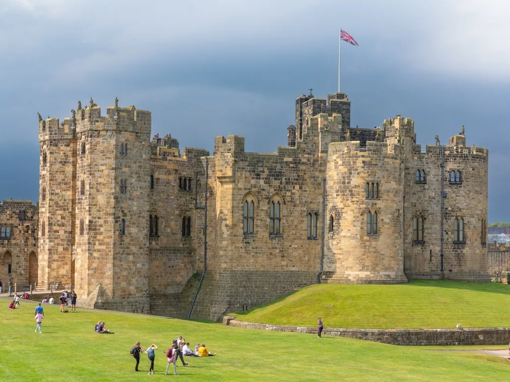 Alnwick, Northumberland, England - August 14 2024: Alnwick castle with union flag flying
