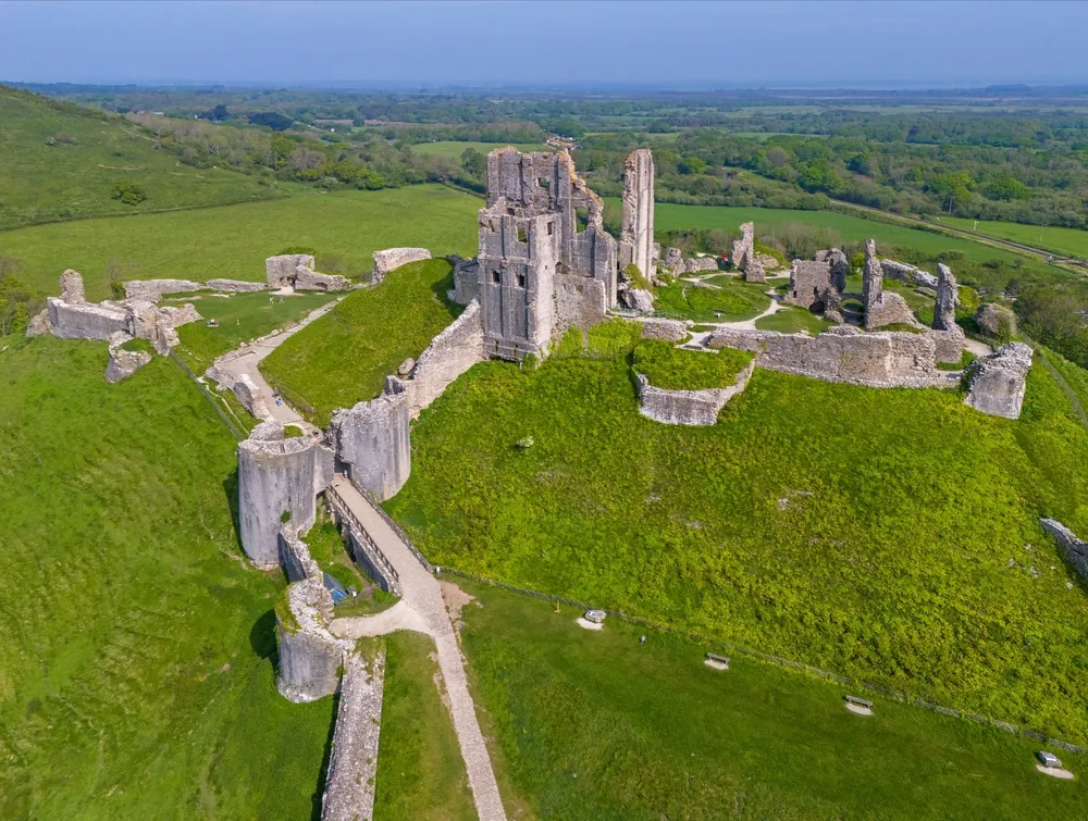 Corfe Castle, Dorset. United Kingdom. 05 11 2024 A fine Spring Aerial Image of the ruins of Corfe Castle. 11th May 2024