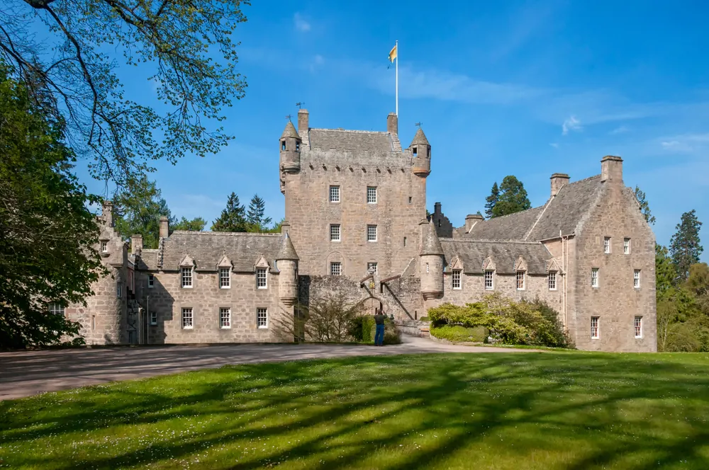 Invergordon, Nairnshire, Scotland - May 22, 2012: Entrance to Cawdor Castle, fairy tale castle and gardens, famous for its links to Shakespeare's 'Macbeth' and portrayal of the murder of King Duncan.