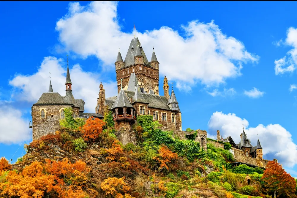Cochem Castle, also known as Reichsburg Cochem, is a majestic medieval castle overlooking the town of Cochem on the Moselle River in Germany.