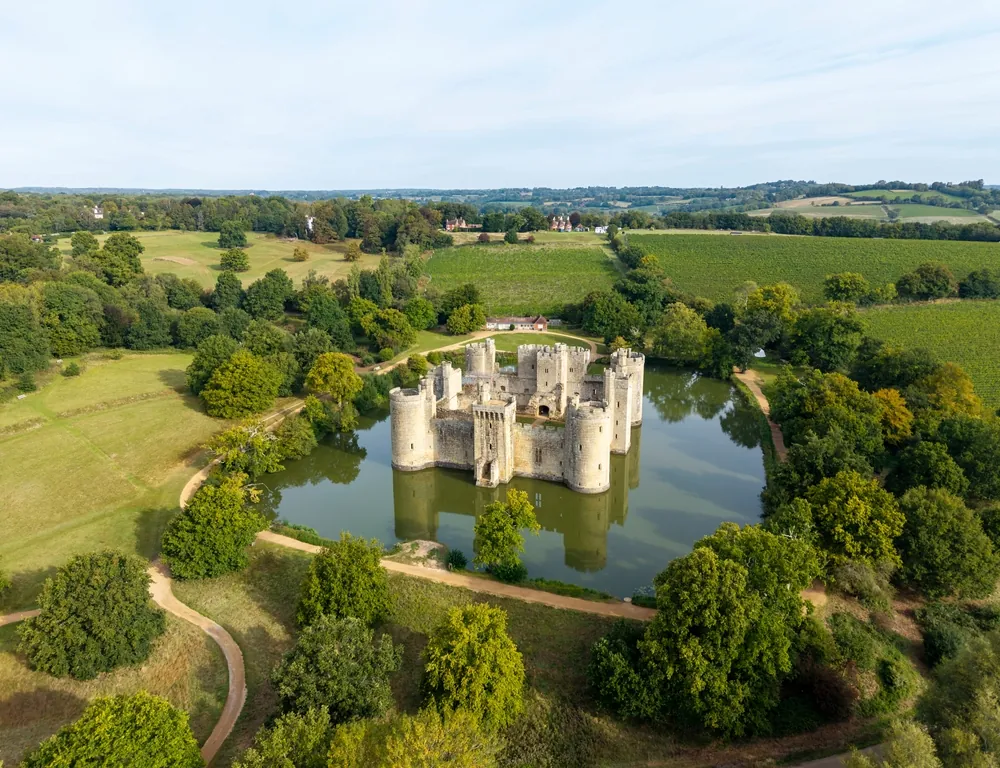 ROBERTSBRIDGE, EAST SUSSEX, ENGLAND - SEPTEMBER 06, 2025: Bodiam Castle and moat, aerial view