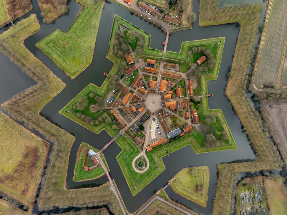 aerial view of Bourtange, a fortified village in the Netherlands. It is a historic star shaped fortification dating from the middle ages.