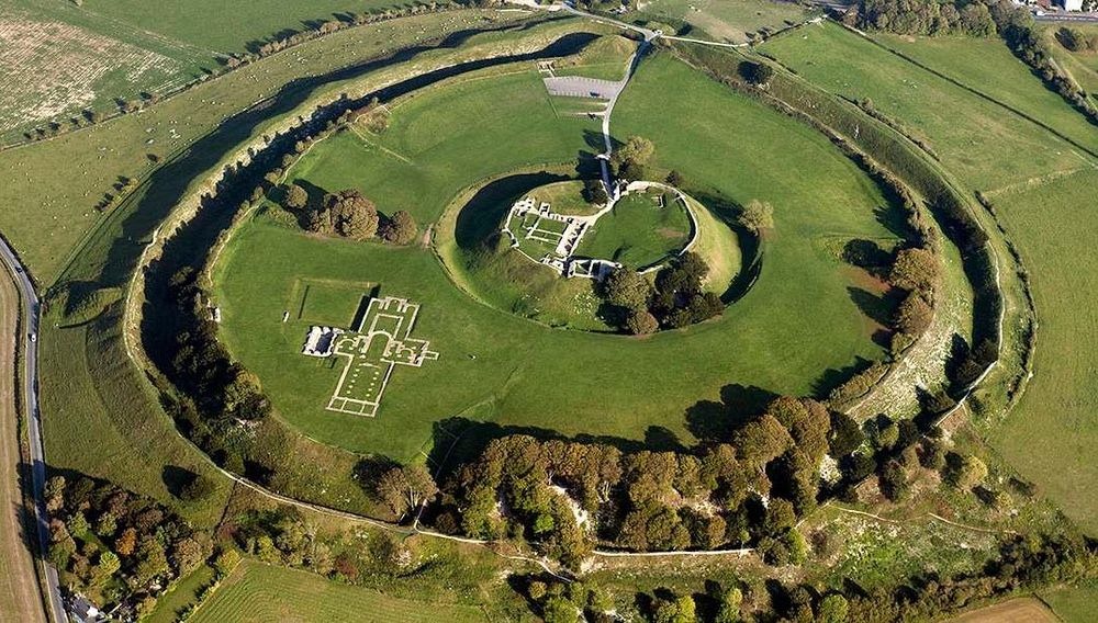 Old Sarum in Wiltshire, the most legible surviving motte-and-bailey castle in England, with the Norman earthworks still readable in the ground