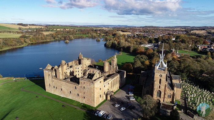 Linlithgow Palace on its lochside in West Lothian, the great Stewart royal residence and birthplace of Mary Queen of Scots, castles near Edinburgh