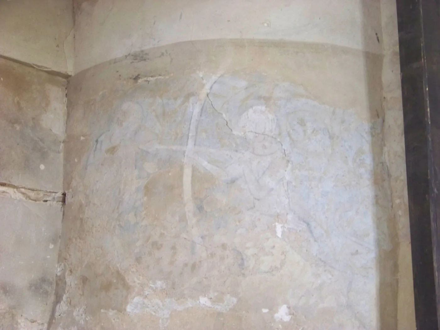 A Gothic fresco of a demonic left-handed archer in Houska Castle's chapel