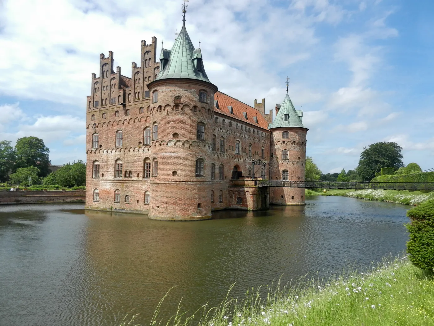 Egeskov Castle and its moat, a fairytale castle in Denmark