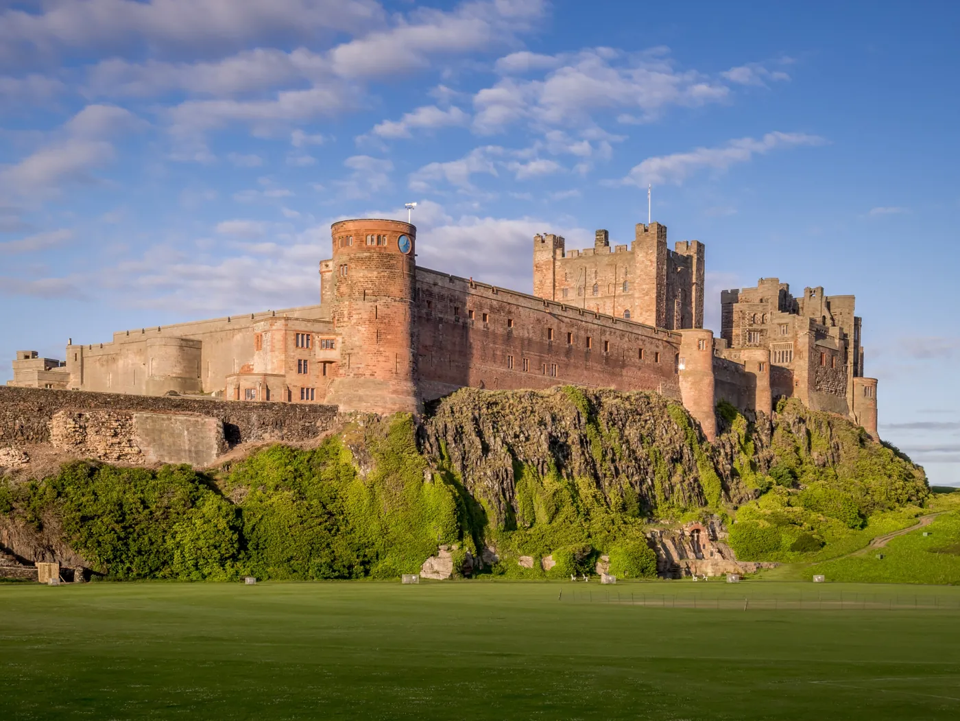 Bamburgh Castle on its basalt crag above the North Sea, one of the most dramatic coastal castles in England